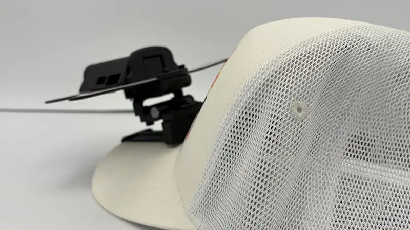 Wearable RecoHand BEAM attached to a cap
