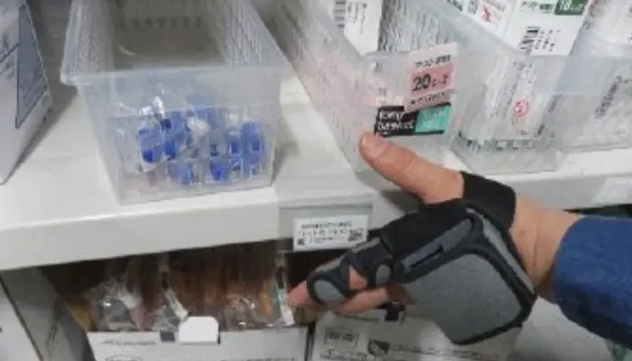 Warehouse worker scanning medical inventory with RecoHand